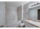 Clean bathroom featuring a tub, a vanity with white cabinet, and tiled floors at 1881 W Alexander Rd # 1135, North Las Vegas, NV 89032