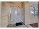 Close-up of condo entrance featuring a secure screen door and a modern aesthetic at 1881 W Alexander Rd # 1135, North Las Vegas, NV 89032