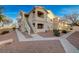 Attractive two-story condo building with private balconies and nicely landscaped common areas at 1881 W Alexander Rd # 1135, North Las Vegas, NV 89032