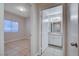 Hallway view into a bedroom and a bathroom with tile floors at 1881 W Alexander Rd # 1135, North Las Vegas, NV 89032