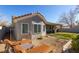 Inviting backyard space with lounge chairs, perfect for relaxing outdoors in privacy at 1905 Sirocco Ct, Las Vegas, NV 89117