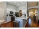 Bright, modern kitchen featuring white cabinetry, stainless steel appliances, and beautiful countertop space at 1905 Sirocco Ct, Las Vegas, NV 89117