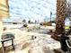 Backyard featuring a patio with grill, gravel landscaping, and a mature tree at 1908 Linden Ave, Las Vegas, NV 89101