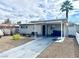 Charming single-story home with covered parking and desert landscaping at 1908 Linden Ave, Las Vegas, NV 89101