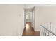 Bright hallway features hardwood flooring and neutral paint throughout the home's upper level at 1968 Granemore St, Las Vegas, NV 89135