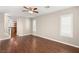 Inviting living space with hardwood floors and neutral paint, seamlessly connecting to the kitchen at 1968 Granemore St, Las Vegas, NV 89135