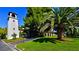 Beautiful manicured landscaping surrounds the exterior of the home at 2305 Plaza Del Grande, Las Vegas, NV 89102