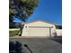 Attached one car garage with direct access on a sunny day at 2305 Plaza Del Grande, Las Vegas, NV 89102