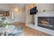 Bright living room featuring a fireplace, tile flooring and an open layout at 2325 Windmill Pkwy # 323, Henderson, NV 89074