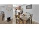 Dining room with wood flooring adjacent to kitchen, illuminated by natural light at 2451 N Rainbow Blvd # 1006, Las Vegas, NV 89108