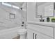 Bathroom featuring a single vanity, toilet, and bath tub with tile surround at 3137 Sunrise Cove Ave, North Las Vegas, NV 89031