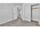 A bedroom with a closet featuring sliding doors, and carpet flooring at 3137 Sunrise Cove Ave, North Las Vegas, NV 89031