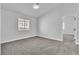 Bright bedroom with neutral carpet and white walls offers relaxing retreat at 3137 Sunrise Cove Ave, North Las Vegas, NV 89031