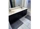 Bathroom with double vanity, marble countertop, and modern fixtures at 3337 Autumn Veil St, Las Vegas, NV 89129