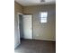 Neutral bedroom features a window for natural light and a closet for storage at 3337 Autumn Veil St, Las Vegas, NV 89129