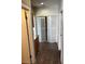 Hallway featuring bi-fold doors to laundry, plus adjacent counter space at 3337 Autumn Veil St, Las Vegas, NV 89129