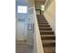 Inviting carpeted staircase with white railings leading to the upper level at 3337 Autumn Veil St, Las Vegas, NV 89129