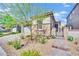 Charming single-story home featuring stone accents, desert landscaping, and a brick paver walkway at 343 American Dipper St, Las Vegas, NV 89138