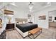 Serene main bedroom features a neutral color palette and comfortable furnishings at 343 American Dipper St, Las Vegas, NV 89138