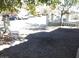 Paved driveway with decorative brickwork leading to a home with a decorative perimeter fence at 3539 Japan Way, Las Vegas, NV 89115