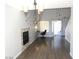 Bright and airy living room featuring stylish lighting, a modern fireplace, and an open layout for versatile living at 3539 Japan Way, Las Vegas, NV 89115