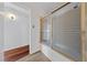 Bathroom featuring a glass-enclosed shower and hardwood-style flooring at 4272 E Russell Rd, Las Vegas, NV 89120