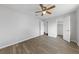 Comfortable bedroom with a ceiling fan, closet, and wood-look flooring at 4272 E Russell Rd, Las Vegas, NV 89120