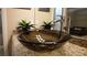 Close-up of bathroom with granite counter and a sleek vessel sink at 5059 Pensier St, Las Vegas, NV 89135