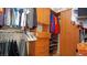 Walk-in closet with shelving and closet rods provides ample storage space at 5059 Pensier St, Las Vegas, NV 89135