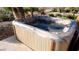 Inviting backyard hot tub with desert landscaping at 5059 Pensier St, Las Vegas, NV 89135