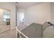 Serene bedroom with neutral carpet and a large window providing ample natural light at 5078 Shadow River St, Las Vegas, NV 89148