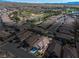 Panoramic aerial view of a neighborhood with lush green spaces, a golf course, and beautiful homes at 5081 Monte Penne Way, Pahrump, NV 89061