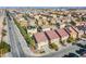 A neighborhood aerial view with many two story homes and mature landscaping in a well maintained neighborhood at 5186 Bootlegger Ave, Las Vegas, NV 89141