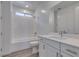 Clean bathroom featuring a shower-tub combo, modern vanity, and neutral finishes at 522 Riley Ridge Ct, Henderson, NV 89012