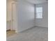 Bright bedroom with a window and plush gray carpet at 522 Riley Ridge Ct, Henderson, NV 89012