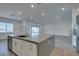 Modern kitchen featuring an oversized island, stainless steel appliances, and ample counter space at 522 Riley Ridge Ct, Henderson, NV 89012