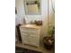 Bathroom featuring a modern vanity with a light countertop and a decorative mirror at 535 Straight St, Las Vegas, NV 89110