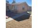 Exterior of the home showcasing the patio area and architectural style at 535 Straight St, Las Vegas, NV 89110