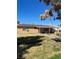 Charming single-story home with well-kept lawn and solar panels installed on the roof at 535 Straight St, Las Vegas, NV 89110