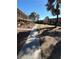 A beautiful landscape of the apartment complex with a sidewalk at 575 S Royal Crest Cir # 18, Las Vegas, NV 89169