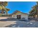 Equestrian barn with covered porch and ample parking for trucks and trailers at 6925 Donald Nelson Ave, Las Vegas, NV 89131