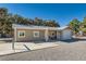 Exterior shot of home featuring a driveway, garage, and covered patio at 6925 Donald Nelson Ave, Las Vegas, NV 89131