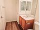 Bathroom featuring tile flooring, a vanity, toilet and door to shower-tub combo at 7123 S Durango Dr # 206, Las Vegas, NV 89113