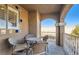 Charming balcony with seating offers a relaxing outdoor space with neighborhood views at 7250 Diamond Canyon Ln # 204, Las Vegas, NV 89149