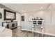 Hallway with a decorative cabinet, mirror, and modern art pieces at 7250 Diamond Canyon Ln # 204, Las Vegas, NV 89149