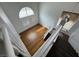 A view from the top of the stairway shows a view of the living room area below at 7509 Wheat Grass Ct, Las Vegas, NV 89129