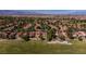 Panoramic aerial shot capturing a golf community with mature trees and lush greenery at 7685 Spanish Bay Dr, Las Vegas, NV 89113