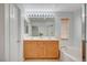 Bathroom featuring double sinks, soaking tub, and walk-in shower at 8027 Anasazi Ranch Ave, Las Vegas, NV 89131