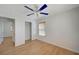 Bedroom featuring laminate wood flooring, ceiling fan, and closet at 8027 Anasazi Ranch Ave, Las Vegas, NV 89131