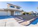 Desirable two-story home boasting an attached garage and well-maintained landscape at 804 Vincent Way, Las Vegas, NV 89145